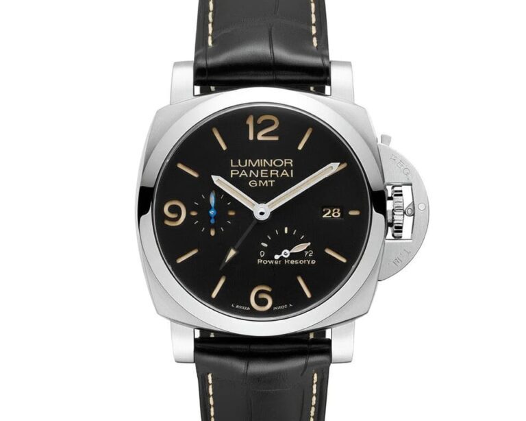 Panerai Luminor GMT watch featuring black dial with power reserve indicator, date display, steel cushion case and black leather strap with iconic crown guard