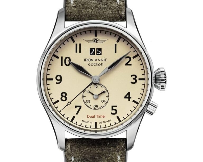 Iron Annie Cockpit dual time aviation watch with cream dial, stainless steel case, and leather strap showcasing German watchmaking quality