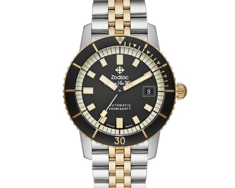 Zodiac Super Sea Wolf dive watch with black dial, rotating bezel, and two-tone steel gold bracelet