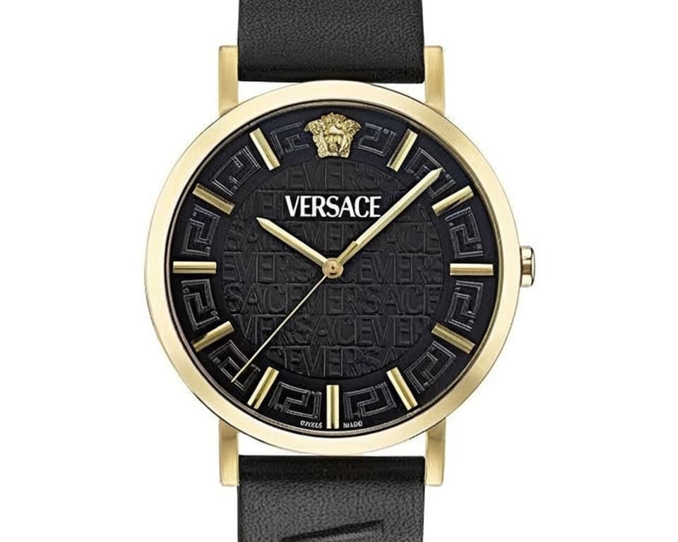 Versace watch with gold-tone case, black dial featuring Greek key pattern, gold Medusa head, and black leather strap