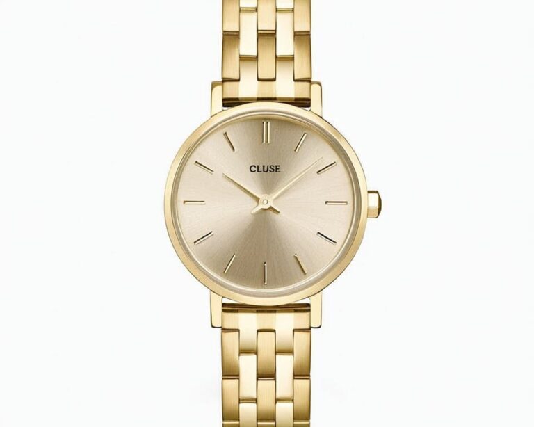 Cluse watch with gold-tone stainless steel link bracelet and minimalist champagne dial showing clean design aesthetic