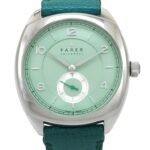 Farer Universal cushion case watch with mint green dial small seconds subdial and teal leather strap on white background